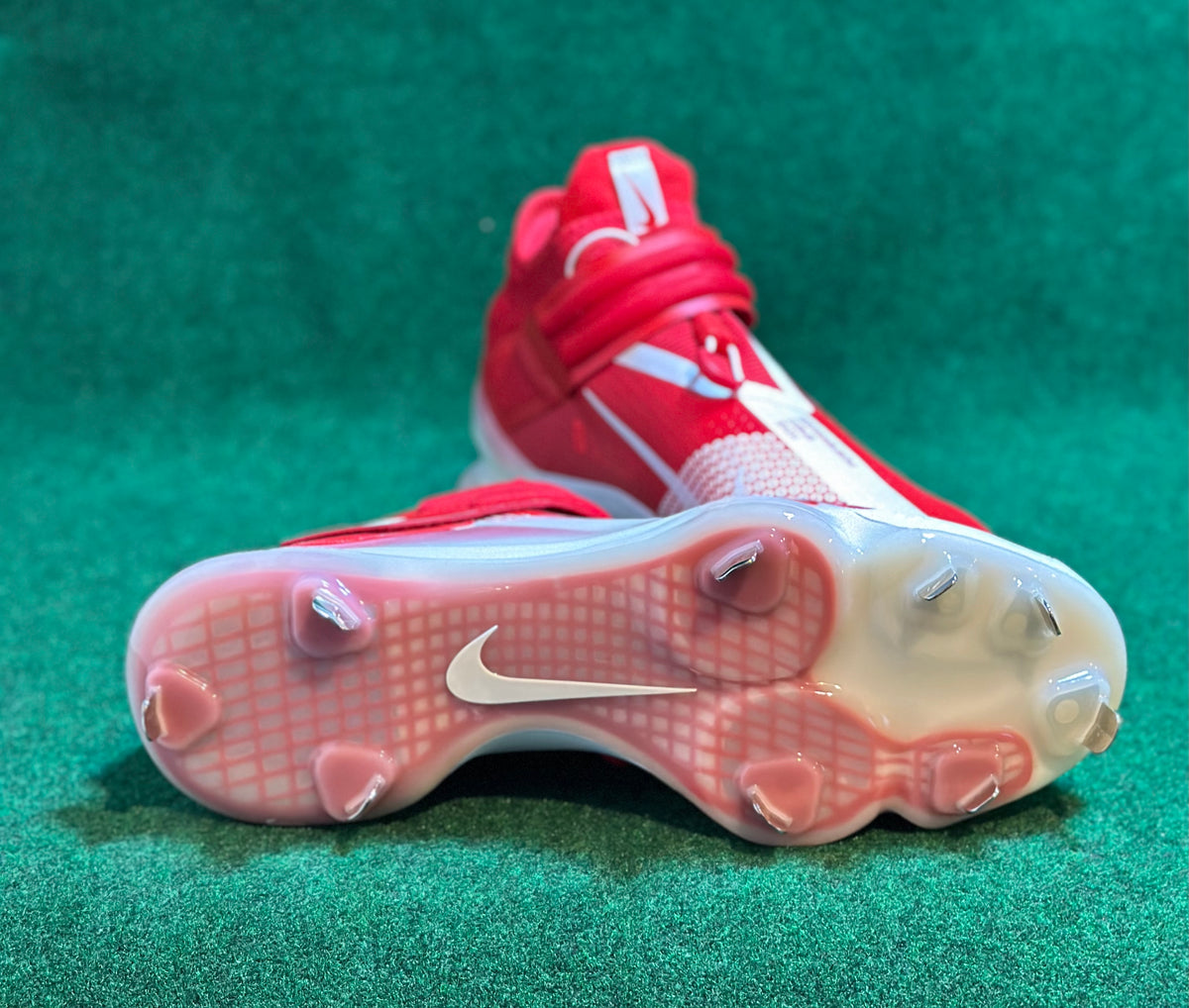 Red and white 2024 nike baseball cleats